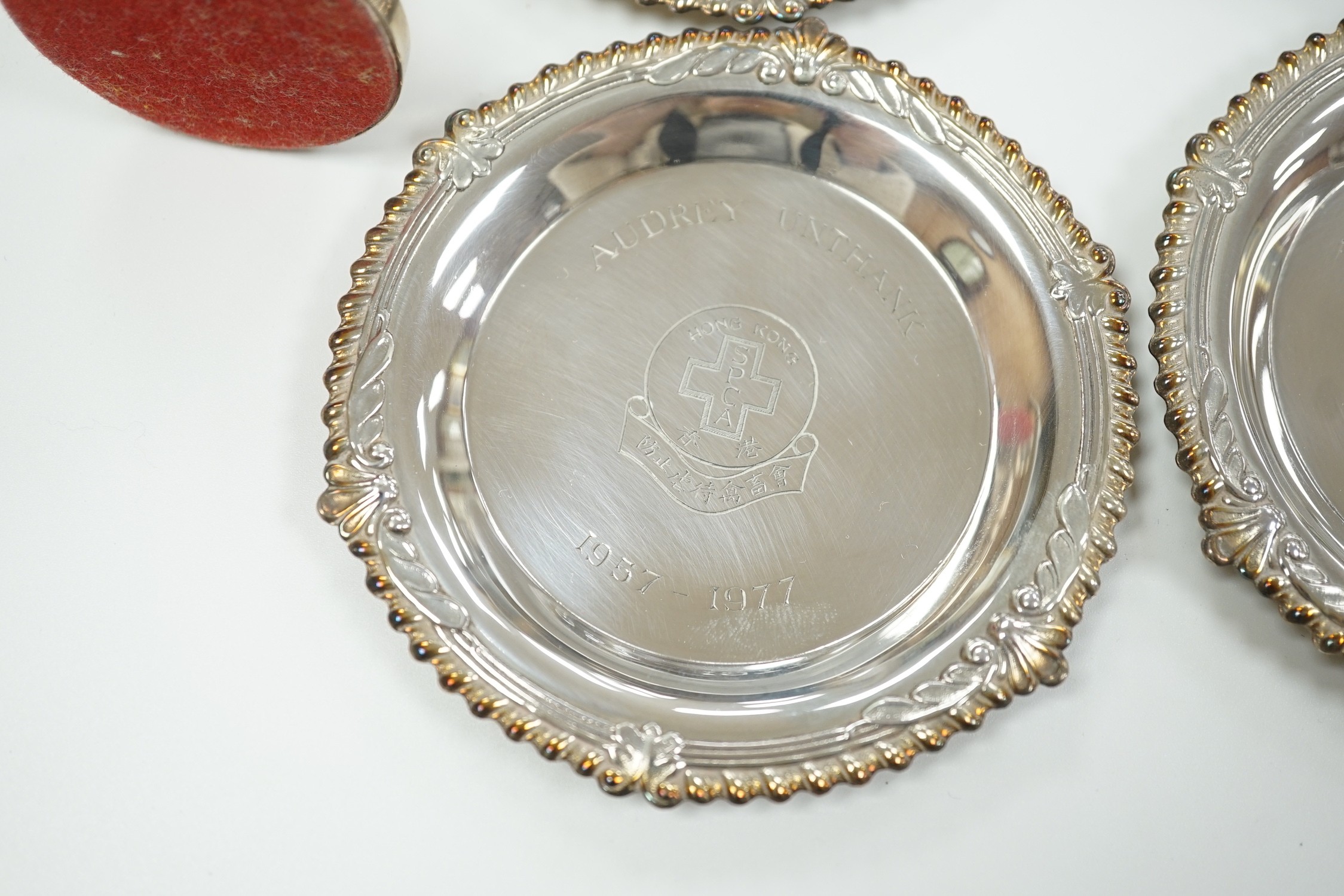 A Chinese sterling mounted cigarette box by Wai Kee, 92mm, a set of six modern silver small dishes, a silver tea strainer, par of Georgian silver sugar tongs and a modern silver mounted posy vase.